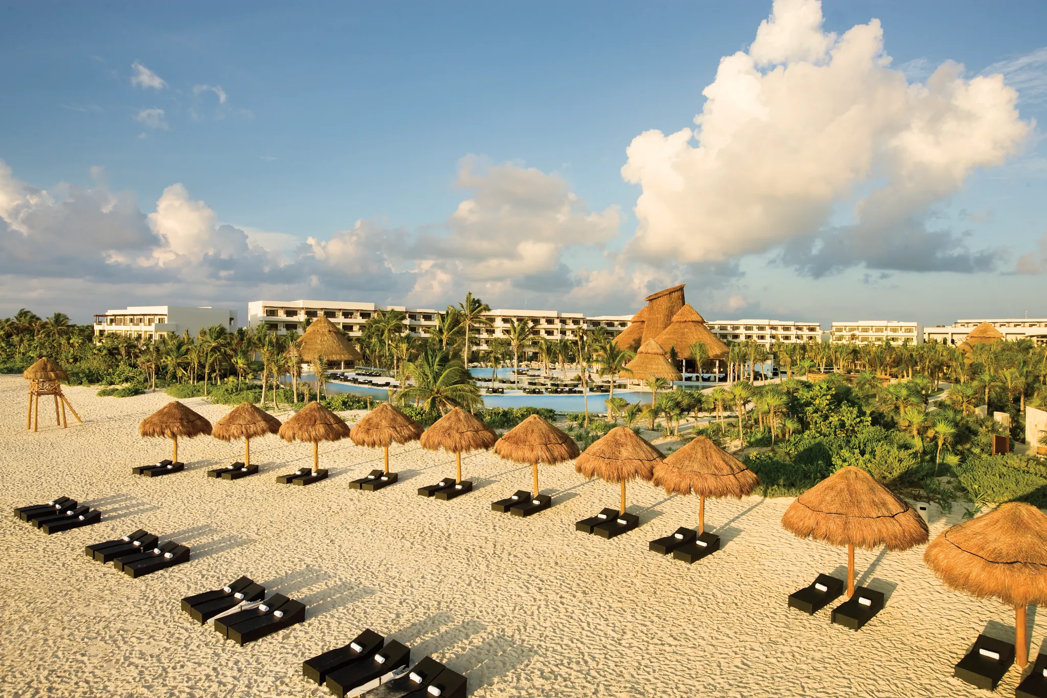 Aerial of Maroma Beach with lounge chairs in front of a resort