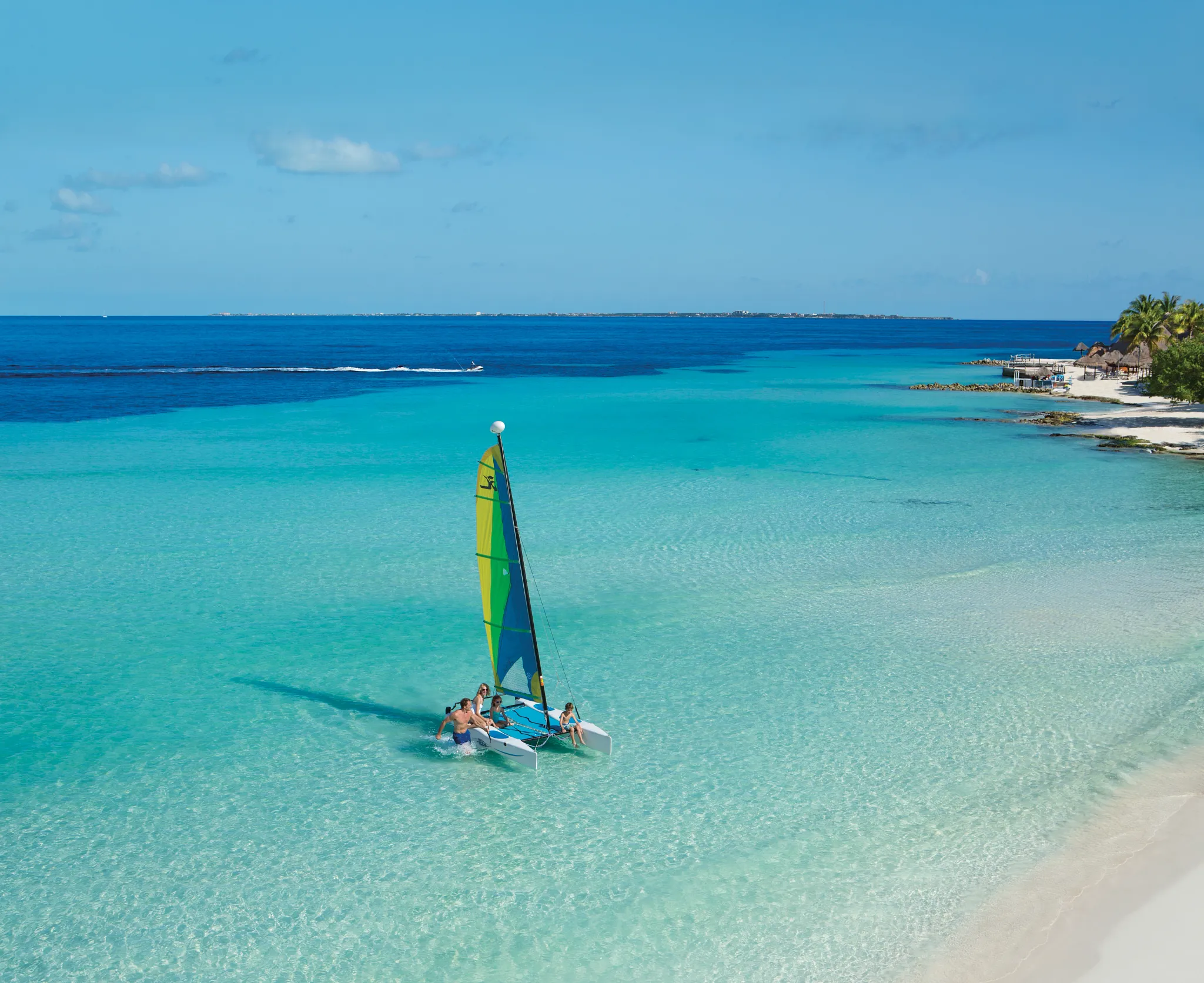 Family sailing in the ocean