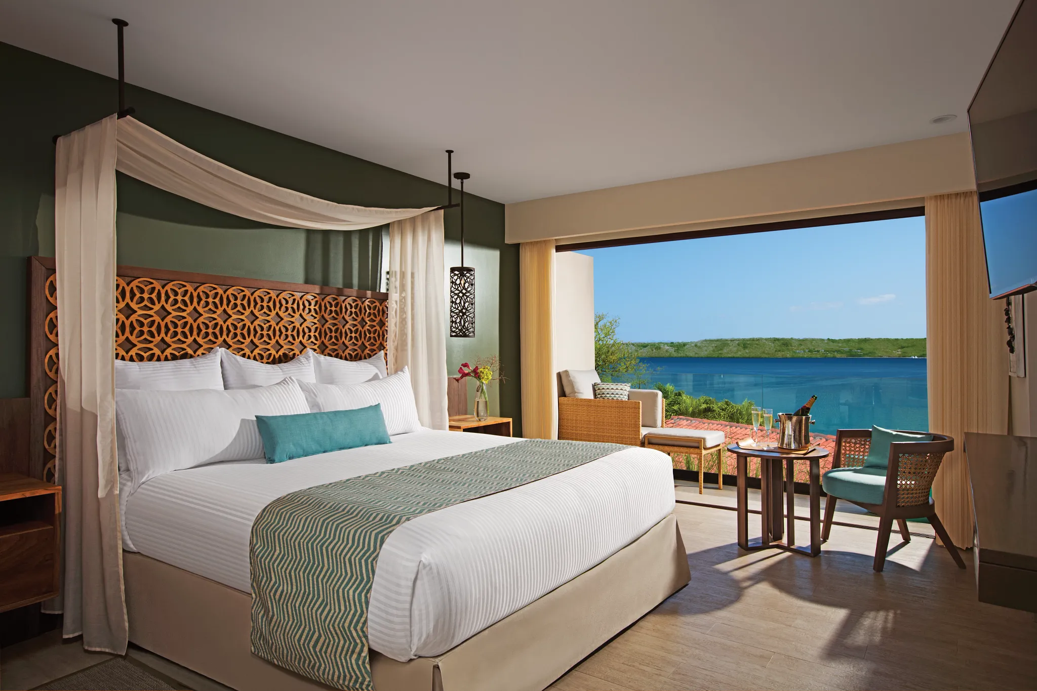 King bed hotel room overlooking the ocean in costa rica