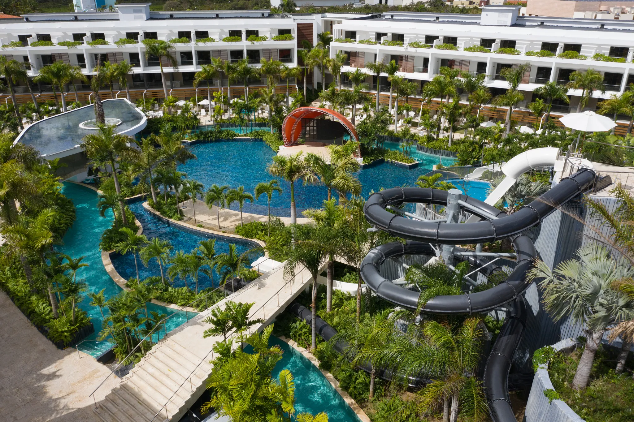 aerial of a resort waterpark showing pools and waterslides