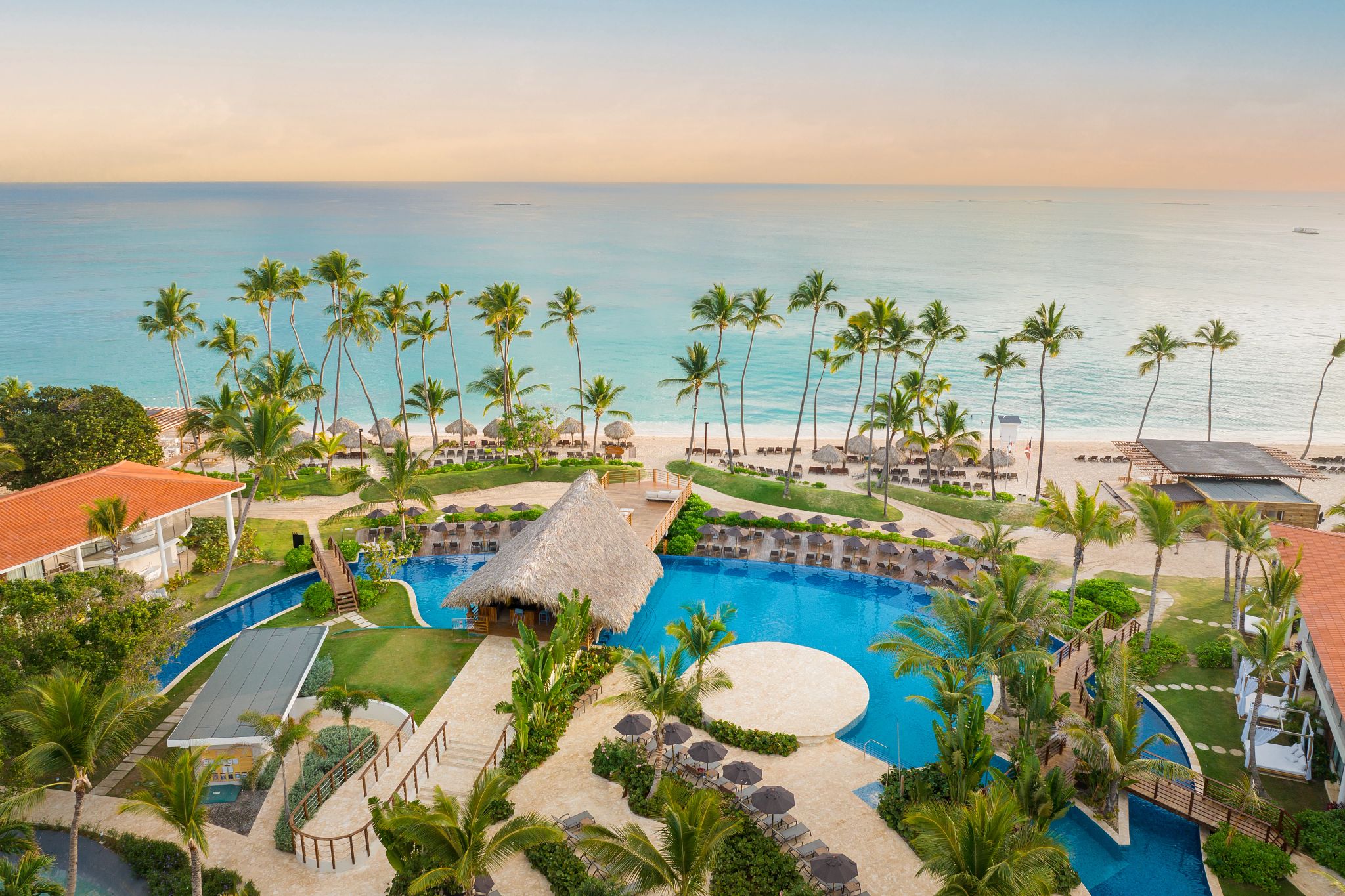 Main resort pool aerial, beachfront.